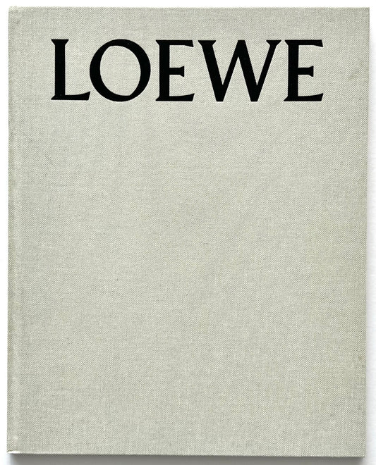 LOEWE Spring Summer 2015 Womenswear, creative direction by M/M (Paris), published 2015. Pale grey cloth hardcover with oversized black LOEWE typography.