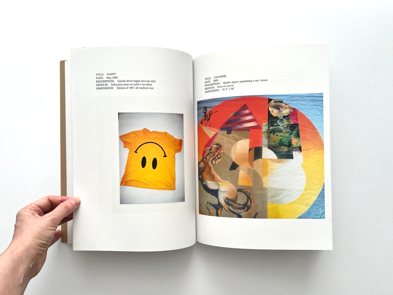 Lutz Bacher: Snow (2013), interior spread with yellow “Happy” t-shirt featuring distorted smiley face and “Universe” painting with layered collage, horse figure and circular sun-like form