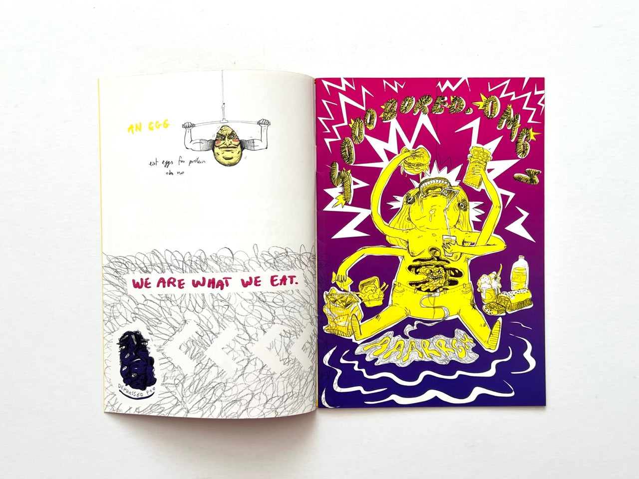 Mind Ur Food by Ayam Tulum (2017) — Two-page composition pairing the handwritten statement “We Are What We Eat” with an exaggerated yellow figure surrounded by packets and food, while an egg character performs a pull-up above.