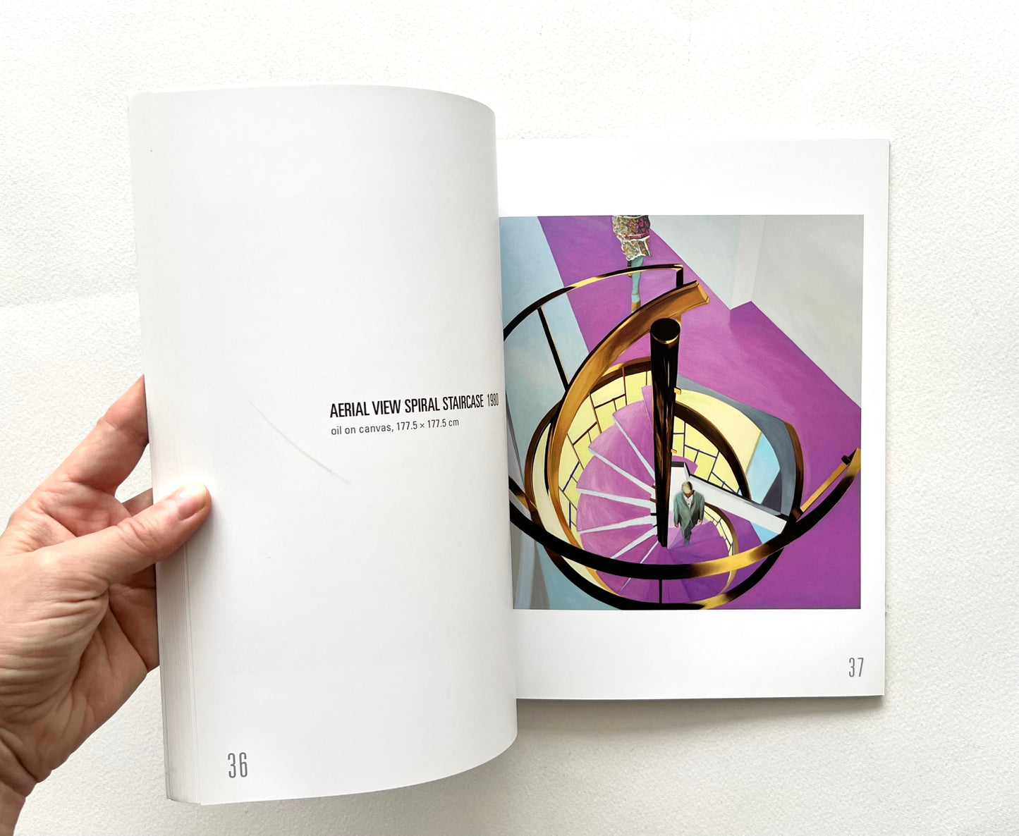 An open 'Neil Stokoe: Paintings from the 60s on' book with a colorful spiral staircase artwork.