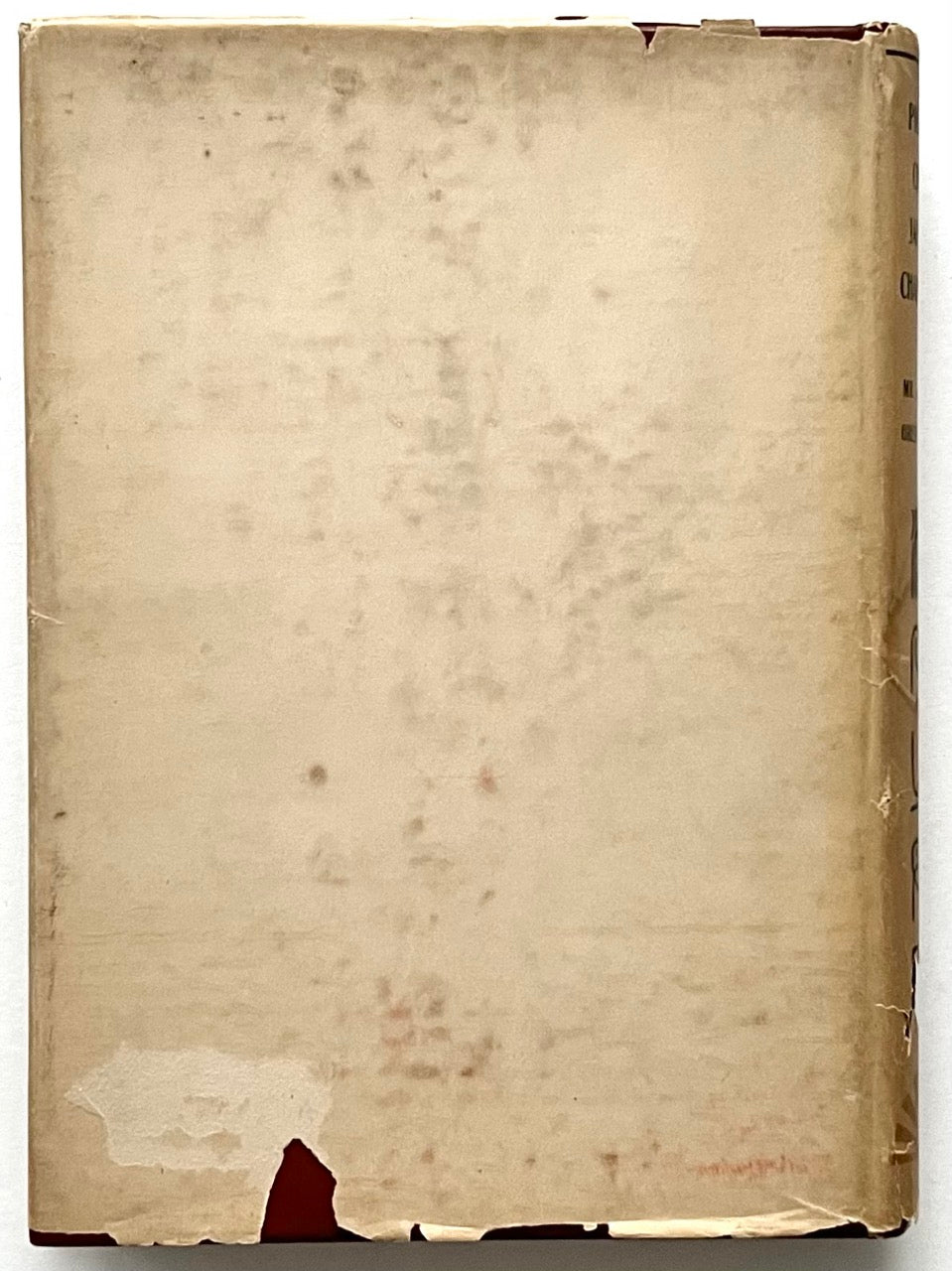 Back of the original dust jacket of Pictorial Chinese-Japanese Characters showing heavy wear, staining and tears