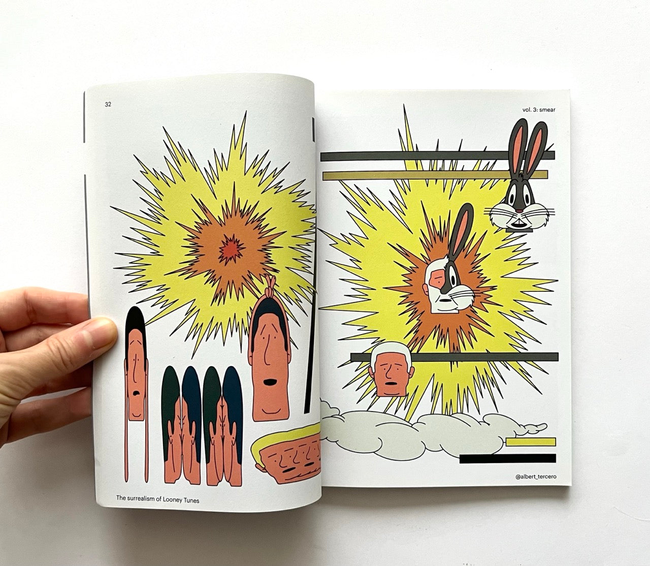 Open book - 'Smear: the surrealism of Looney Tunes vol. 3' - showing cartoon illustrations of a rabbit and other characters with a sun in the background.