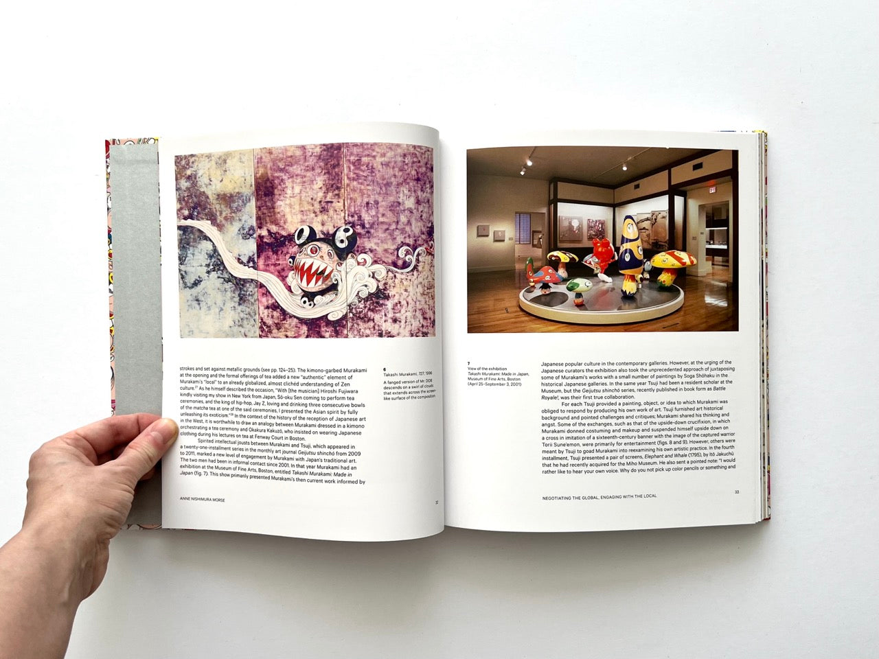Takashi Murakami Lineage of Eccentrics interior spread showing a painting of a stylised creature on the left and a museum installation with colourful sculptures on the right