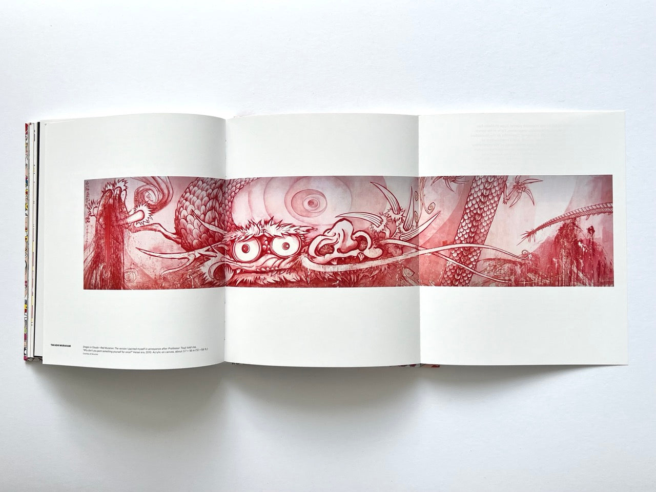 Takashi Murakami Lineage of Eccentrics fold-out spread showing a panoramic red ink dragon composition across multiple pages