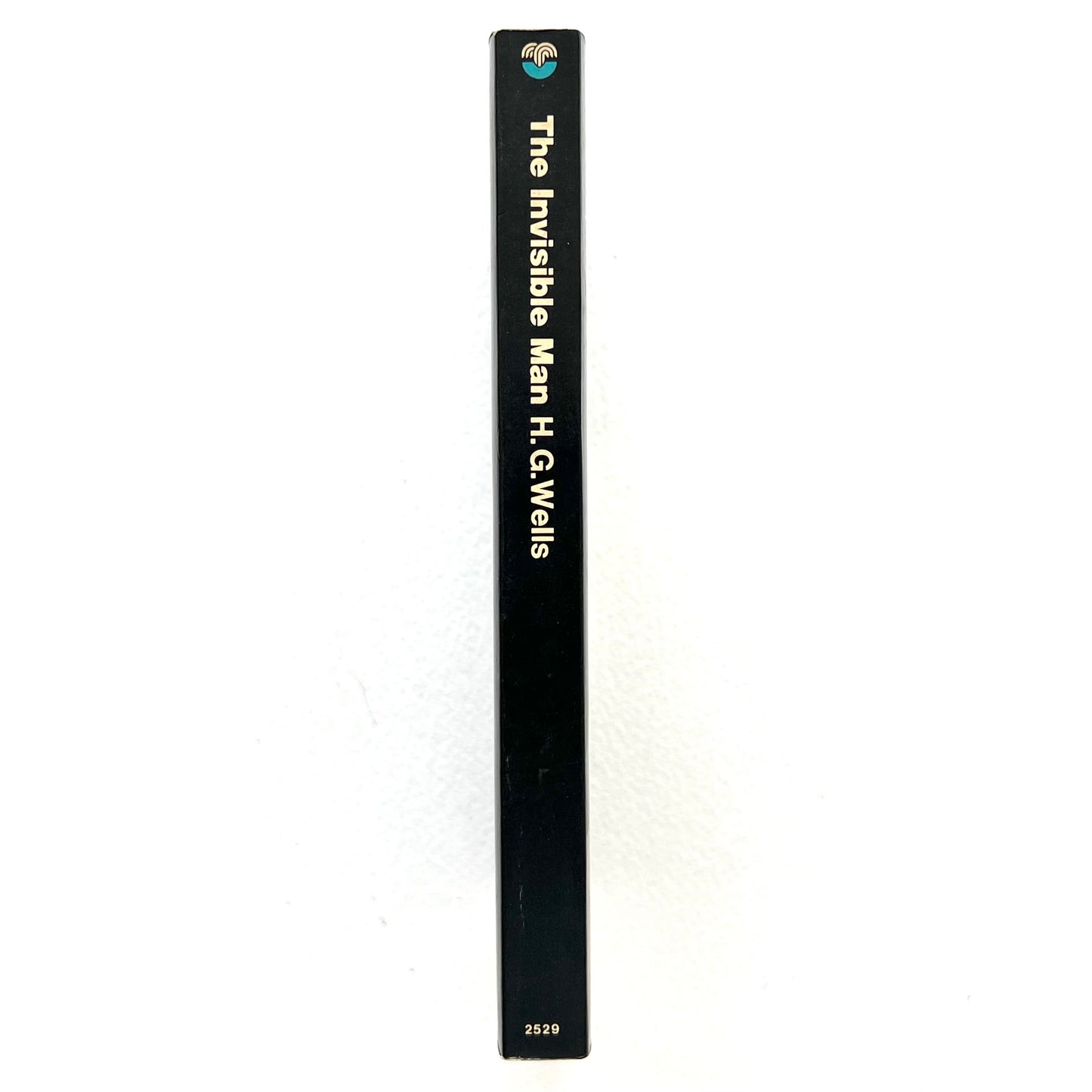 Book titled 'The Invisible Man' by H.G. Wells on a white background
