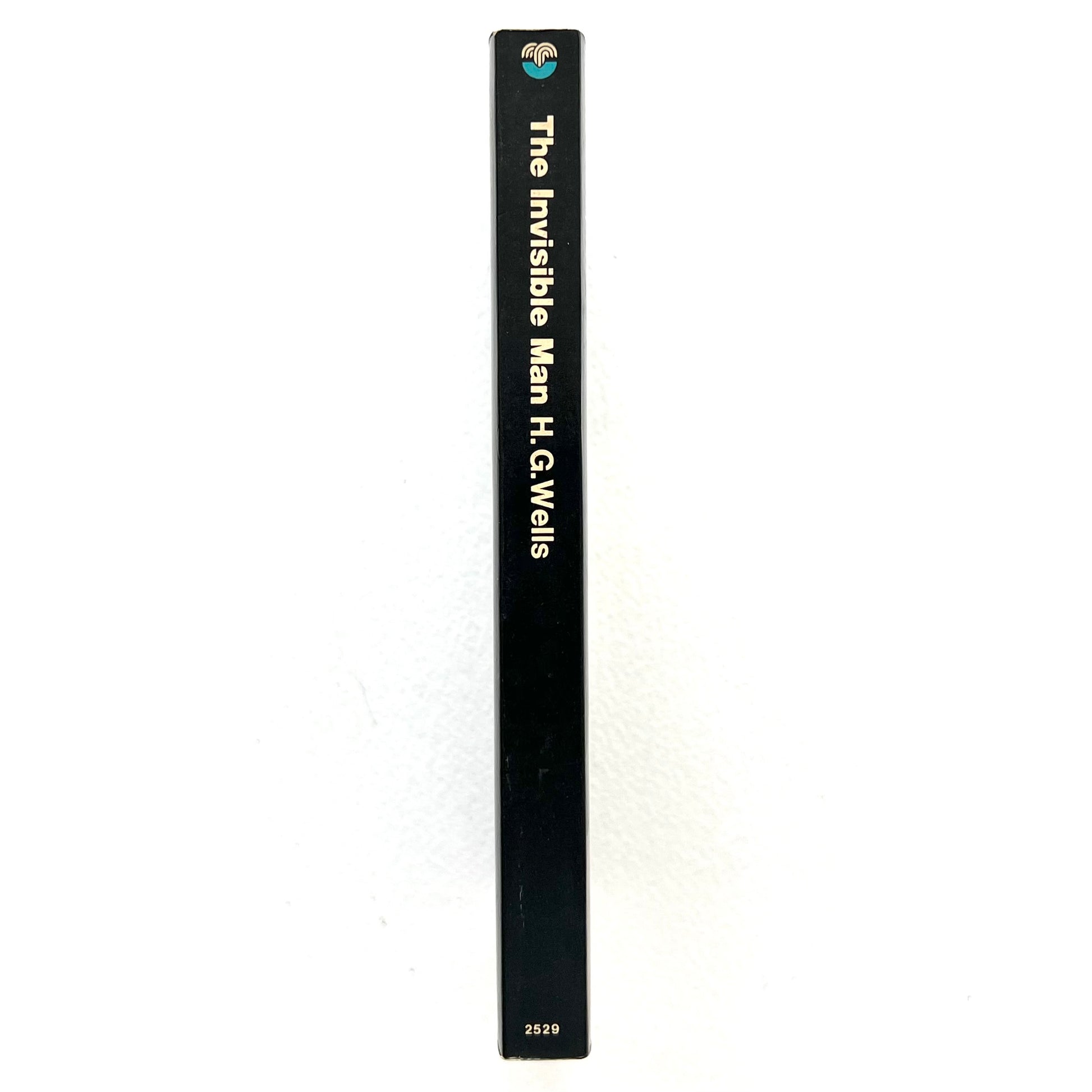 Book titled 'The Invisible Man' by H.G. Wells on a white background