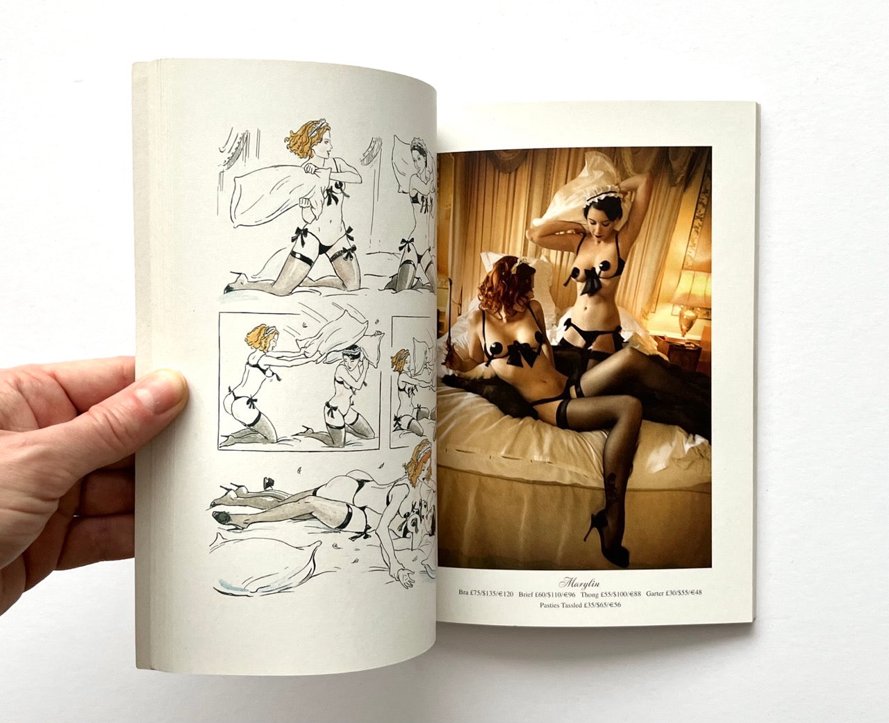 Open book - 'The Lady of the Manor' by Agent Provocateur - showing erotic illustrations and a photo of women in lingerie aand stockings.