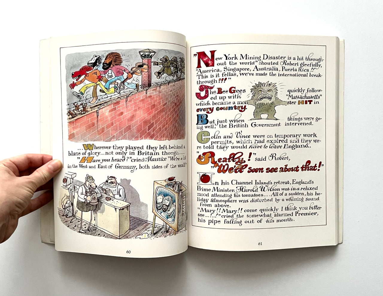 Open book with illustrated pages and text on a white background