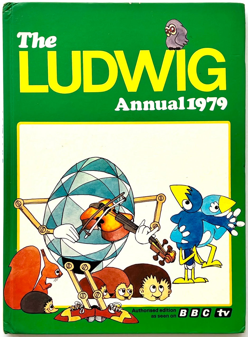 The Ludwig Annual 1979 by Peter Lang, published 1978. Vintage green hardcover with bold yellow lettering and colourful illustrations of Ludwig playing violin, two cartoon birds, a squirrel, hedgehogs and an owl.