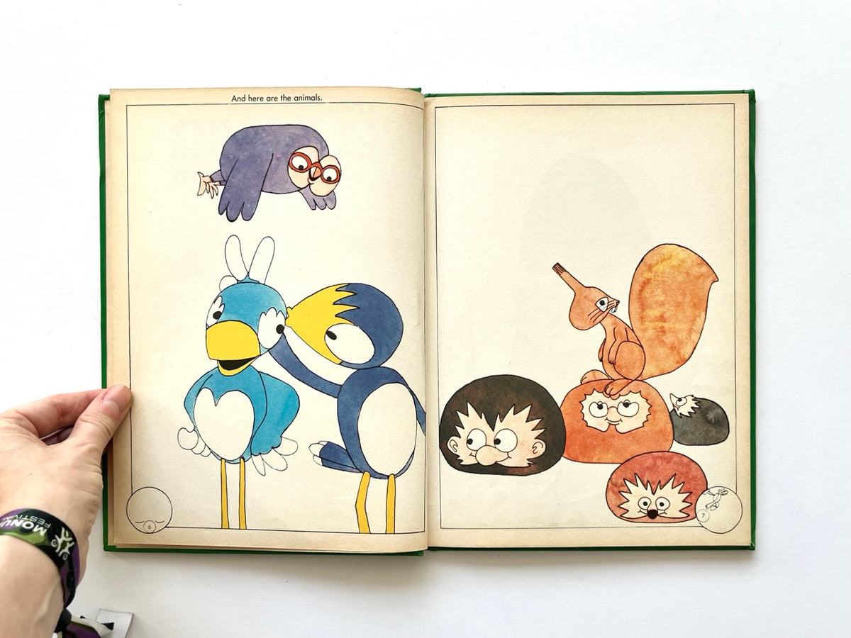 The Ludwig Annual 1979 by Peter Lang, published 1978. Double-page illustration of colourful cartoon birds, an owl, squirrel and hedgehogs in a playful vintage children's book style.