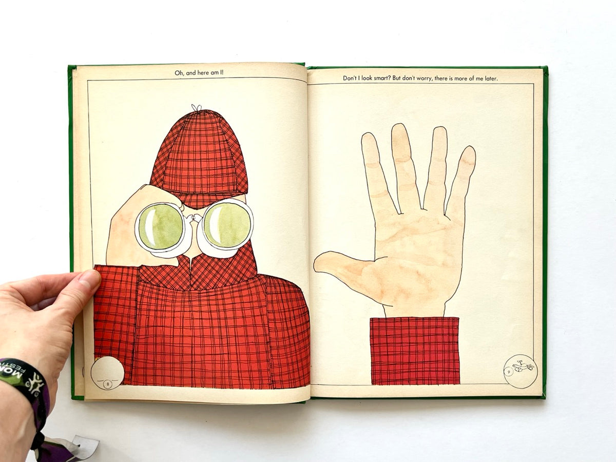 The Ludwig Annual 1979 by Peter Lang, published 1978. Double-page illustration featuring a red tartan-clad narrator looking through binoculars opposite a large illustrated hand.