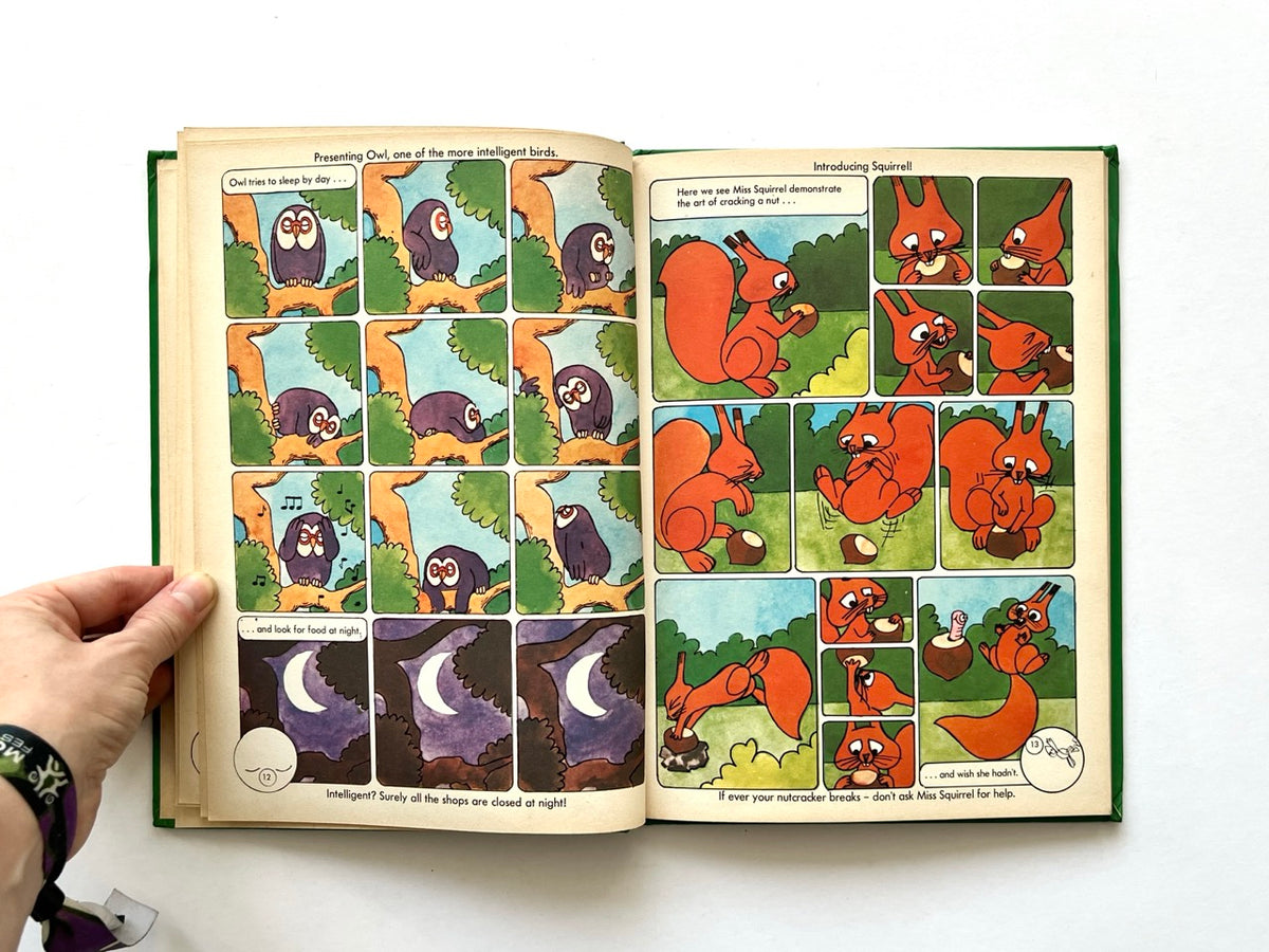 The Ludwig Annual 1979 by Peter Lang, published 1978. Colourful comic-strip illustrations of a purple owl sleeping by day and an orange squirrel cracking a nut, with green woodland backgrounds.