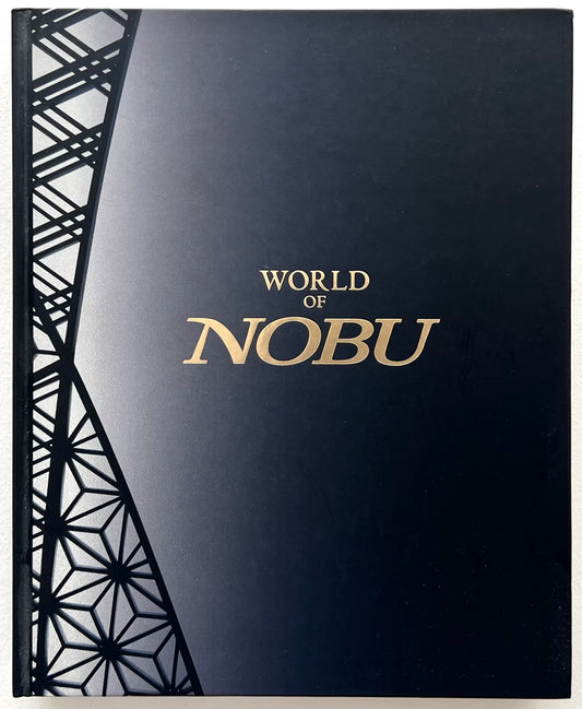 Dark blue book cover with 'World of Nobu' text and geometric patterns
