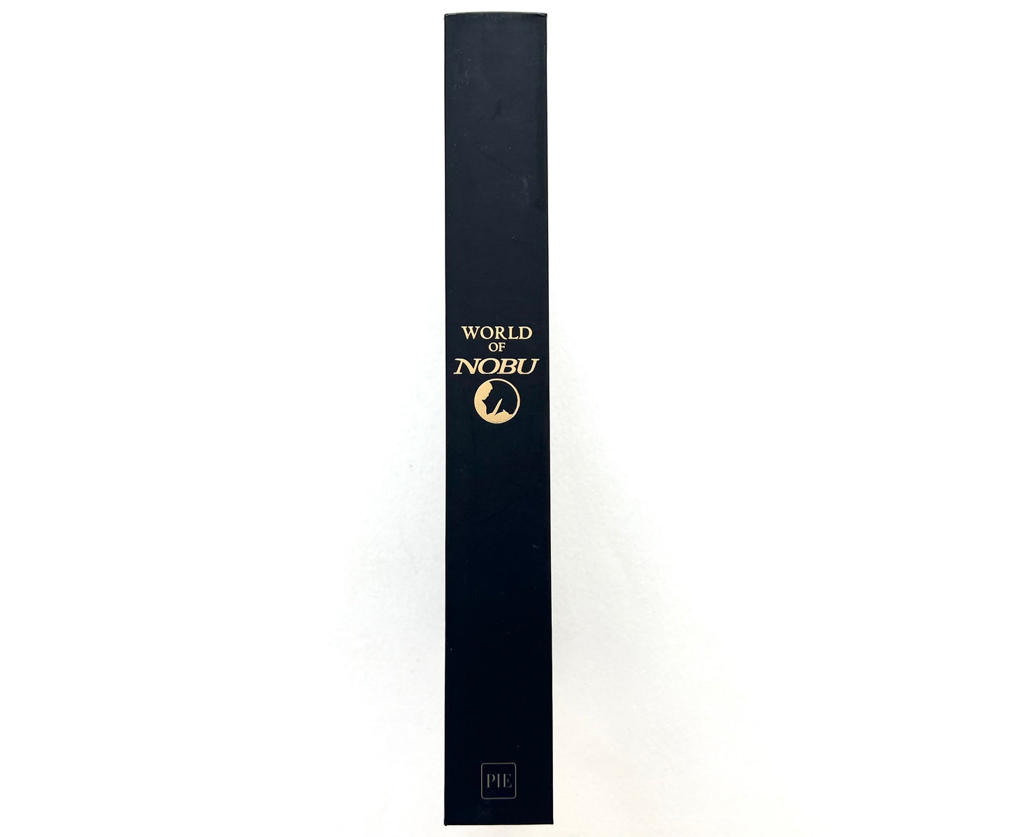 Spine view of the 'World of Nobu' cookbook.