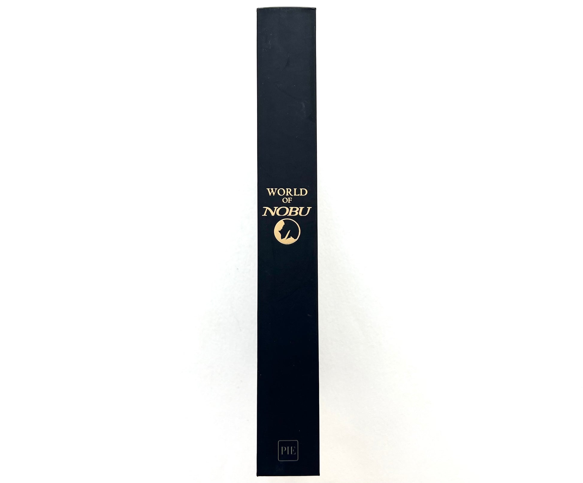 Spine view of the 'World of Nobu' cookbook.