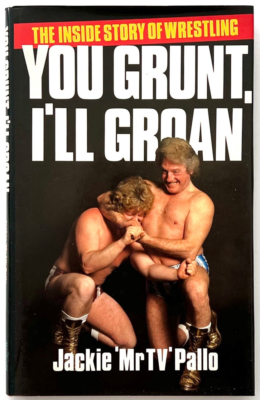 Dust jacket cover of You Grunt, I’ll Groan: The Inside Story of Wrestling by Jackie “Mr TV” Pallo, with staged wrestling photograph on black background.