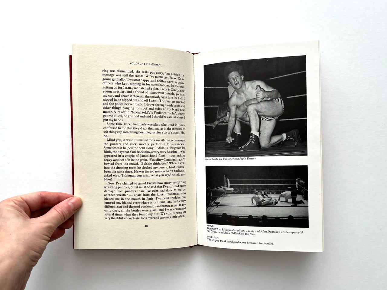 Open spread of You Grunt, I’ll Groan by Jackie Pallo showing text page with two black and white wrestling action photographs