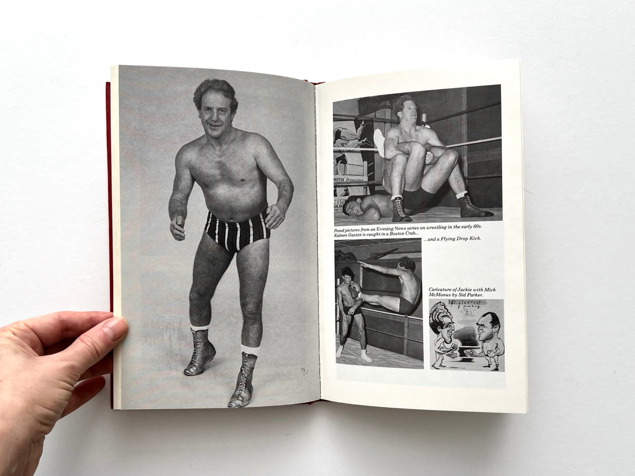 Open spread of You Grunt, I’ll Groan featuring full-page portrait of wrestler in trunks opposite collage of in-ring wrestling scenes and caricature