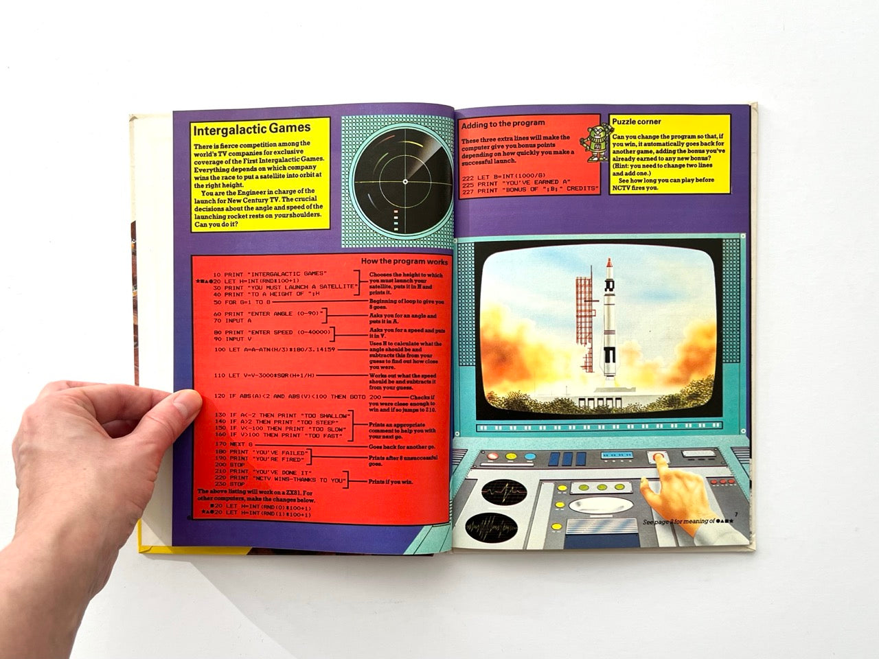 Interior pages from 1982 Usborne computer programming book showing Intergalactic Games BASIC code listing with rocket launch illustration and game instructions