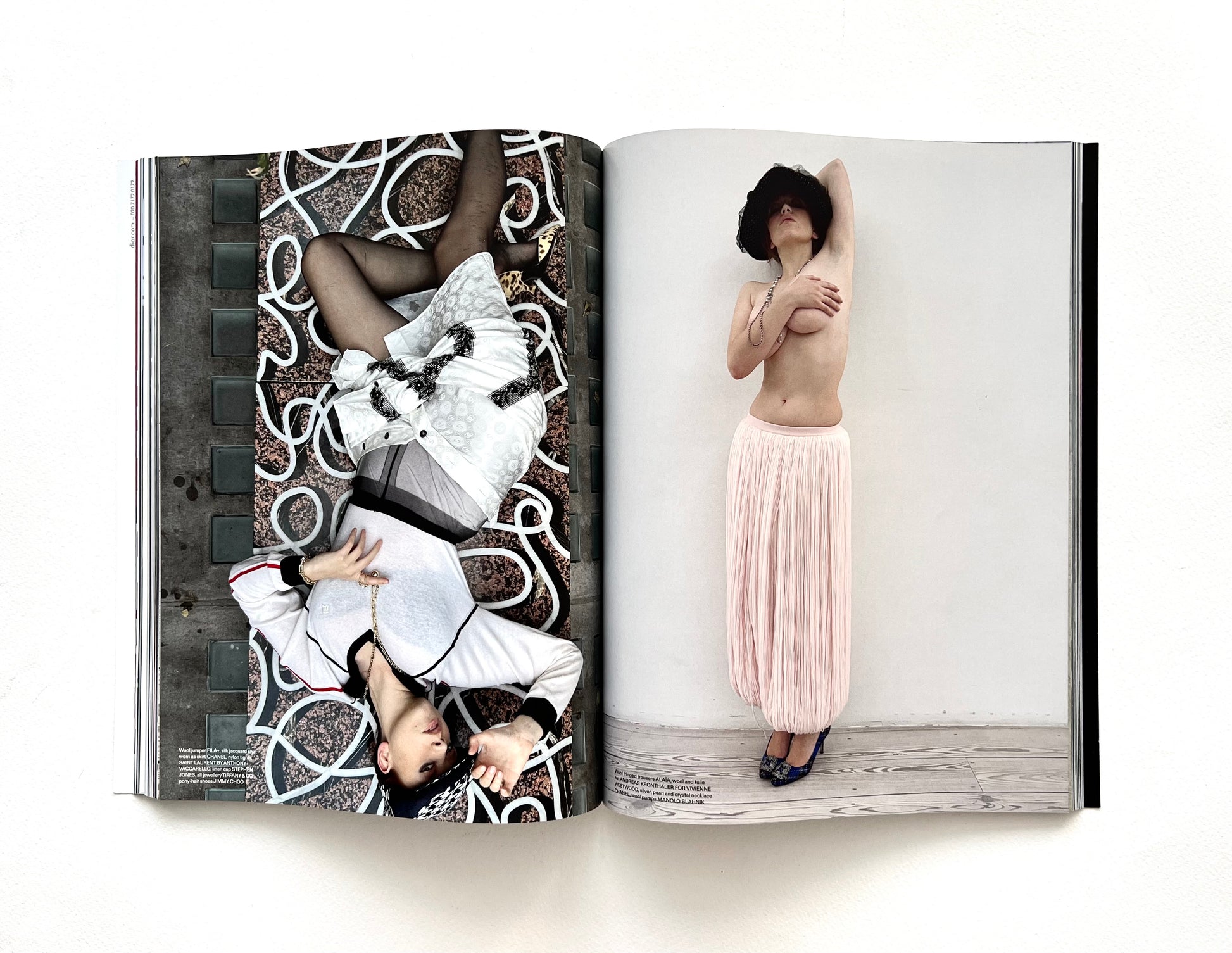 Open fashion magazine showing two pages with women in different poses and outfits.