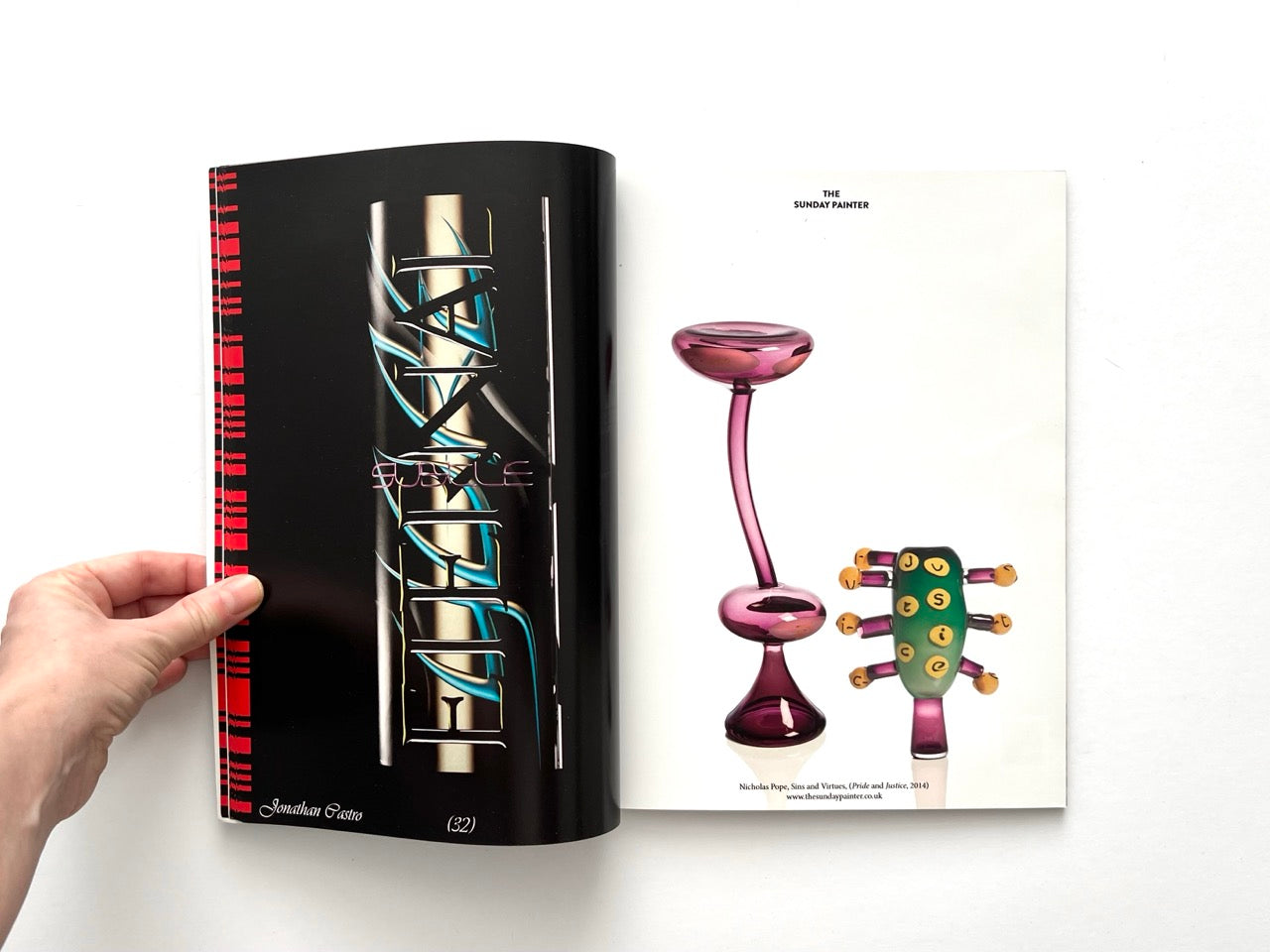 Interior spread of EMULSION Issue One Winter 2018/19 showing a sculptural artwork photographed in a dark gallery setting