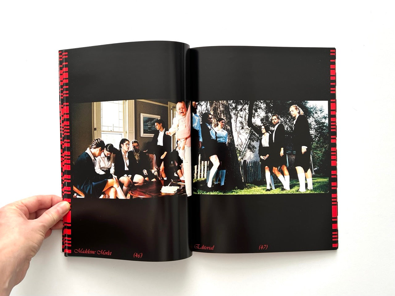Interior spread of EMULSION Issue One Winter 2018/19 showing a staged editorial scene with figures in formal dress
