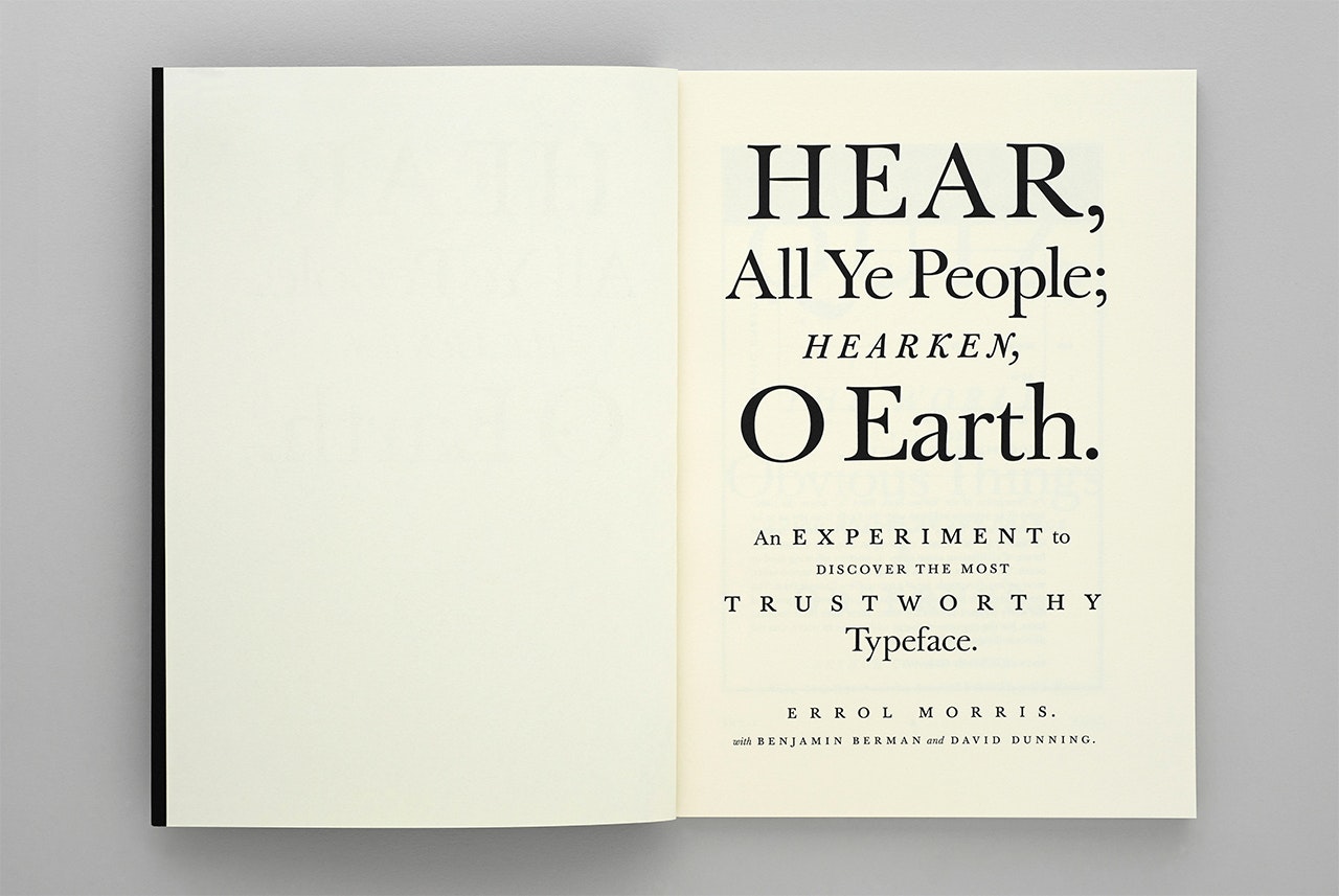 Open book - HEAR, ALL YE PEOPLE; HEARKEN, O EARTH by Errol Morris (2014) - with text on a gray background