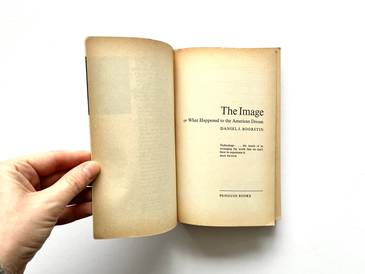 Title page spread of The Image: Or What Happened to the American Dream by Daniel J. Boorstin, showing yellowed pages, centered serif typography, a brief epigraph quote, and the Penguin Books imprint.