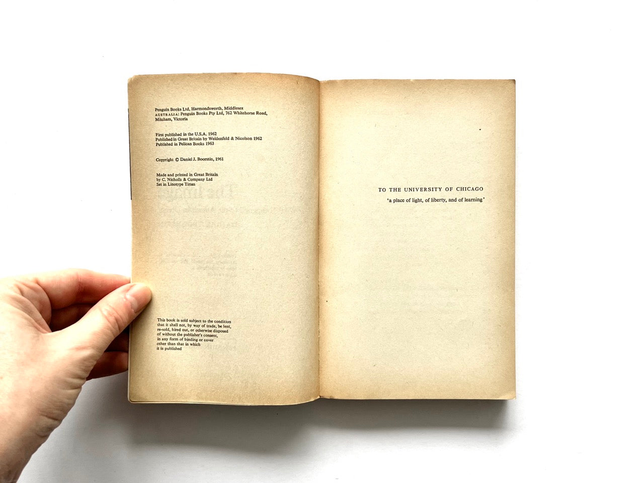 Copyright and dedication page spread of The Image by Daniel J. Boorstin, showing yellowed pages, Penguin Books publication details on the left page, and a dedication to the University of Chicago on the right.
