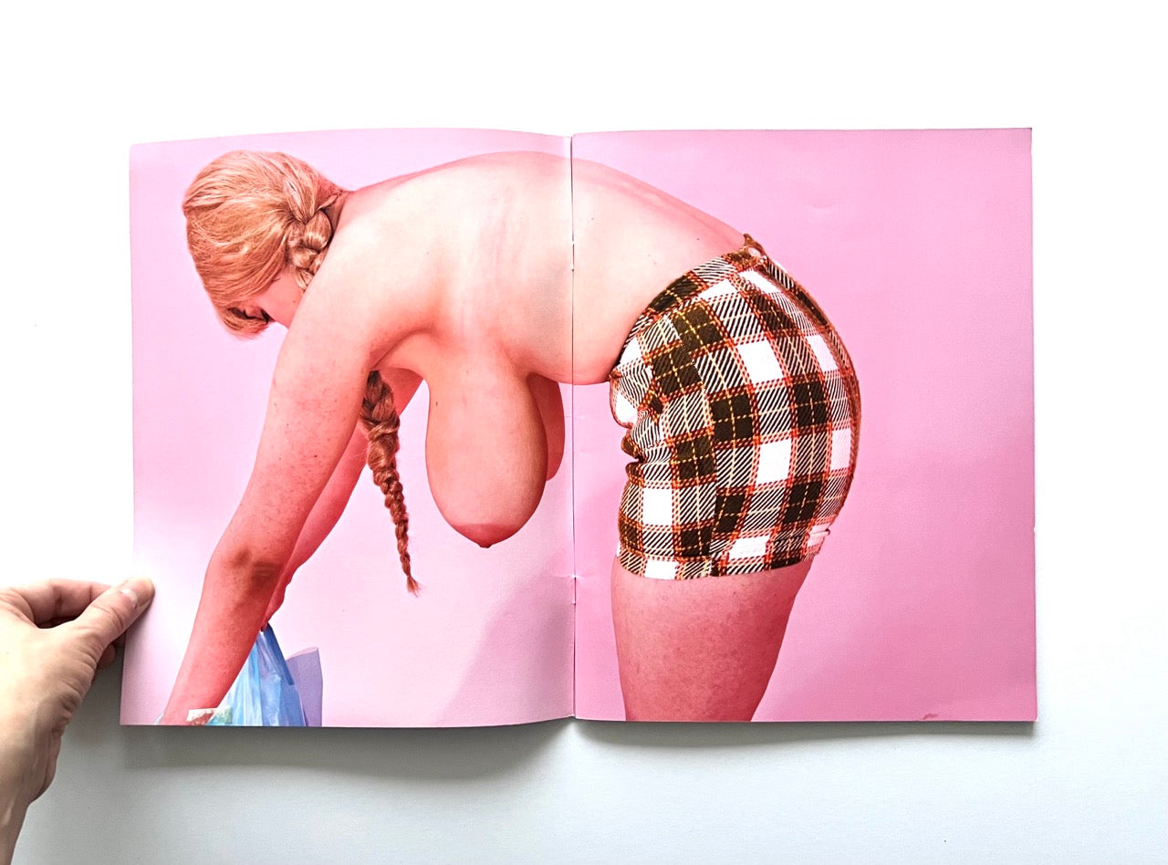 Magazine spread (Toiletpaper No. 7, December 2012) showing a topless woman with unusually elongated breasts photographed against pink background.
