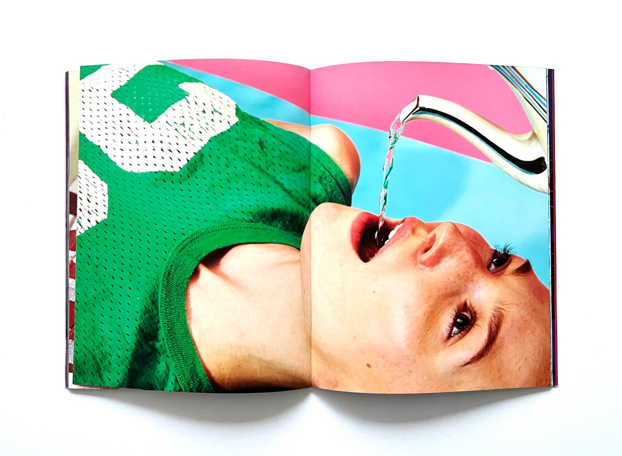 Magazine spread (Toiletpaper No. 7, December 2012) showing water being poured directly from a jug into a woman's open mouth.